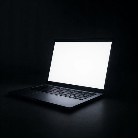 Laptop with blank white screen on black background. Mock up, 3D Renderingの写真素材