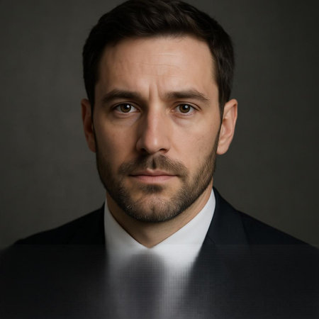 Portrait of a handsome man in a suit on a dark background