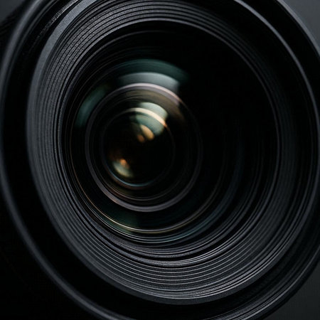 close up of a camera lens on black background, shallow depth of fieldの写真素材