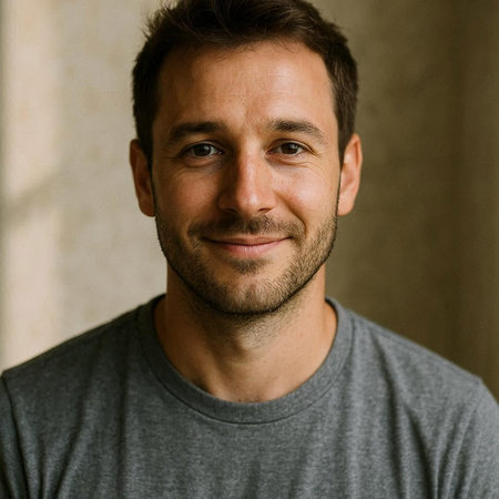 Portrait of a handsome young man in a gray t-shirt