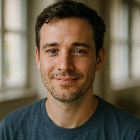 Portrait of a smiling young man looking at the camera. Close-up.
