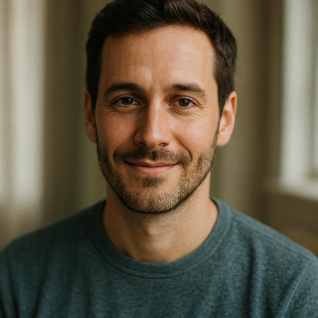 Portrait of a handsome man smiling at the camera. Men's beauty, fashion.