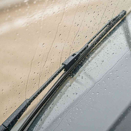 Raindrops on the windshield of a car. Raindrops on the glass.