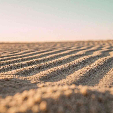 A closeup shot of the texture of a desert sand dune