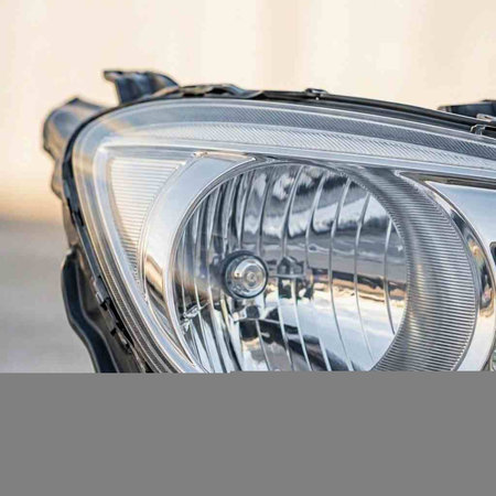 Detail of a headlight of a modern car, close-up