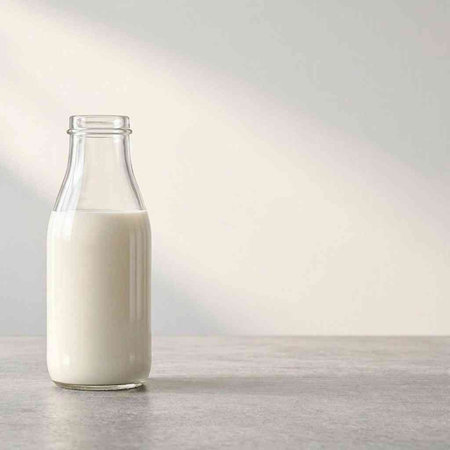 Milk in a bottle on a light background. 3d rendering
