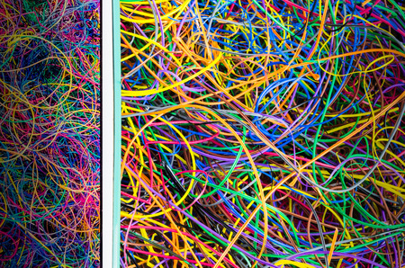 Background from refuse with pieces of demolished electronic wire form old technology network.