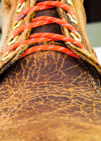 Old leather shoe with selective focus.の写真素材