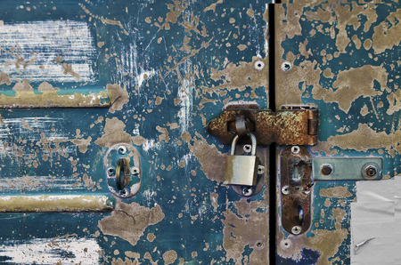 Old door lock with a key.の写真素材