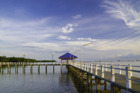 Tropical beach bar with blue sky and cloudscape.の写真素材