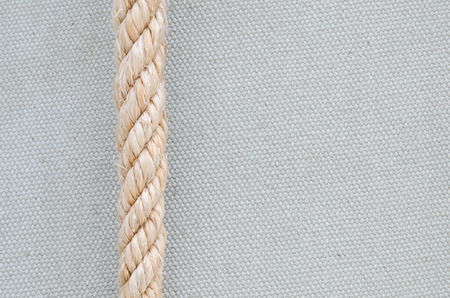 Blank Grungy Canvas Background and rope with selective focus.の写真素材