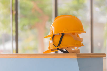 Yellow Construction Hard Hat. Selective focus and blur.の写真素材