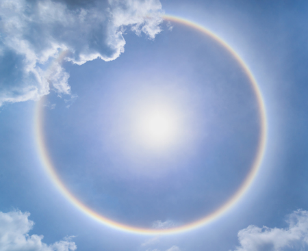 Blur sun halo with cloud in the blue sky.の写真素材