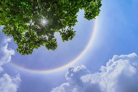 Sun halo with cloud in the blue sky.の写真素材