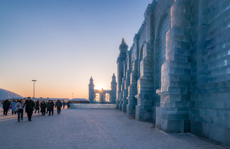 Harbin, Heilongjiang, China - January 11, 2019: Amazing architecture at the ice festival. Ice building in International Ice and Snow Sculpture Festival.  Located in China Harbin Ice and Snow World on sun island in winter that Tourists are visiting.のeditorial素材