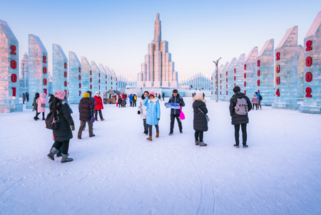 Harbin, Heilongjiang, China - January 11, 2019: Amazing architecture at the ice festival. Ice building in International Ice and Snow Sculpture Festival.  Located in China Harbin Ice and Snow World on sun island in winter that Tourists are visiting.のeditorial素材