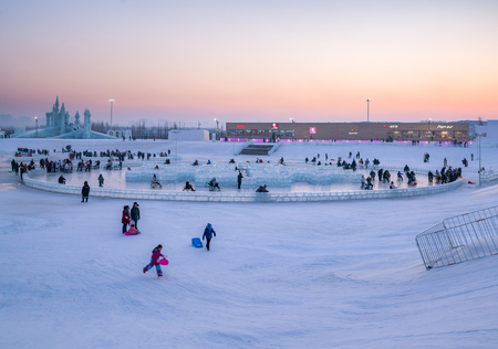 Harbin, Heilongjiang, China - January 11, 2019: Amazing architecture at the ice festival. Ice building in International Ice and Snow Sculpture Festival.  Located in China Harbin Ice and Snow World on sun island in winter that Tourists are visiting.のeditorial素材
