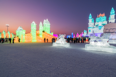 Harbin, Heilongjiang, China - January 11, 2019: Amazing architecture at the ice festival. Ice building in International Ice and Snow Sculpture Festival.  Located in China Harbin Ice and Snow World on sun island in winter that Tourists are visiting.のeditorial素材