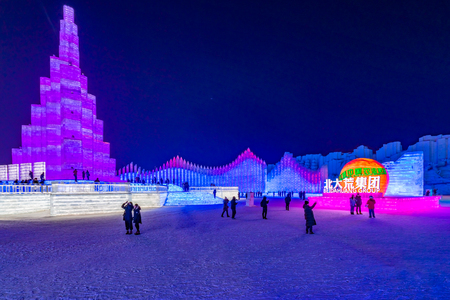 Harbin, Heilongjiang, China - January 11, 2019: Amazing architecture at the ice festival. Ice building in International Ice and Snow Sculpture Festival.  Located in China Harbin Ice and Snow World on sun island in winter that Tourists are visiting.のeditorial素材