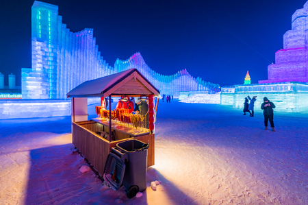 Harbin, Heilongjiang, China - January 11, 2019: Amazing architecture at the ice festival. Ice building in International Ice and Snow Sculpture Festival.  Located in China Harbin Ice and Snow World on sun island in winter that Tourists are visiting.のeditorial素材
