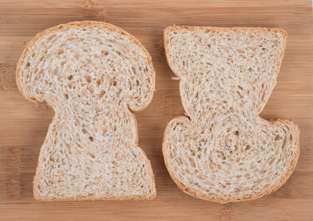 whole wheat bread on table woodenの写真素材