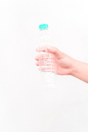 Man holding a bottle of waterの写真素材
