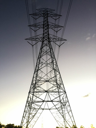 electric pylon at sunset lowlightの写真素材