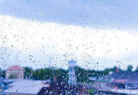 Rainy drop on glassの写真素材