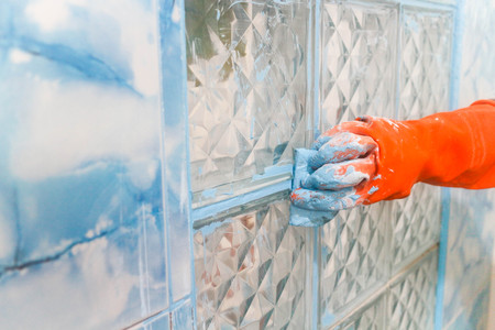 Home renovation - worker tilerの写真素材