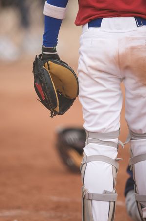 VBaseball catcher watching the play developの写真素材