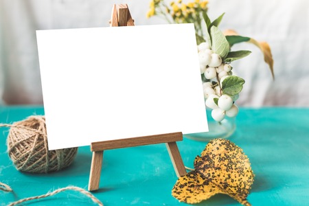 Identity and craft mockup set with retro filter effect. Cute vintage mock up on wooden background. Autumn styled mock-up.の写真素材