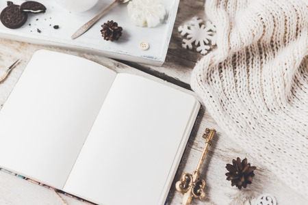 Stylish brending mockup to display your artworks. Cute vintage christmas new year gifts mock up on wooden background.の写真素材