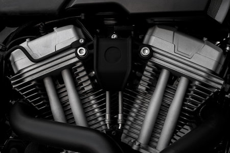 closeup motorcycle engine with soft-focus and over light in the background