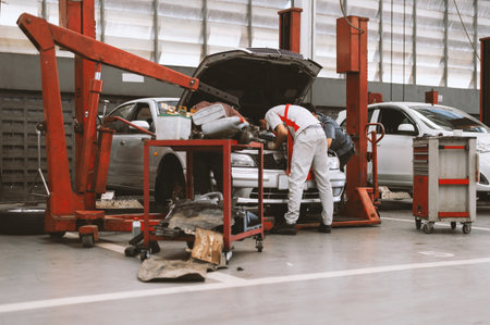 Interior of a  car repair in garage service station with soft-focus and over light in the background