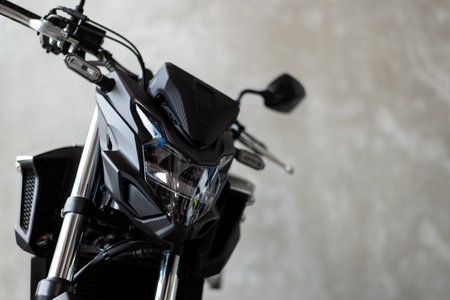 motorcycle bigbike on old brick wall with soft-focus and over light in the background
