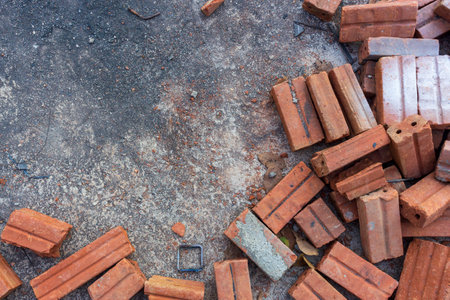 red bricks on cement floor in construction site. top viewの写真素材