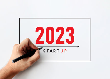 business improvement and change management. businessman draws a line between with old way 2022 and...