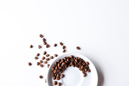 coffee bean on white table background. top view. space for textの写真素材