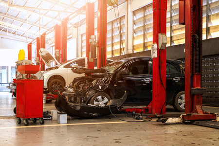 car in automobile repair service center with soft-focus and over light in the backgroundの写真素材
