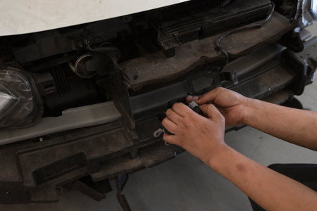 car in automobile repair service center with soft-focus and over light in the backgroundの写真素材