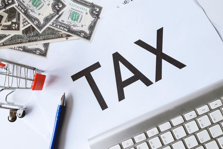 Financial Management in Business: Calculating Taxes, Expenses, and Investments for Economic Successの写真素材