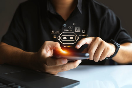 User interacting with AI chatbot on smartphone, highlighting artificial intelligence, mobile...