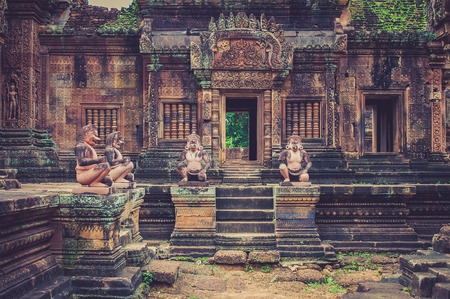 Banteay Srei sandstone Temple with decoration statue figures in Angor Wat, Siemreap, Cambodiaの写真素材