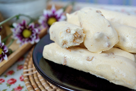 Almond meringues on a plate served with tea or coffee, Afternoon teaの写真素材