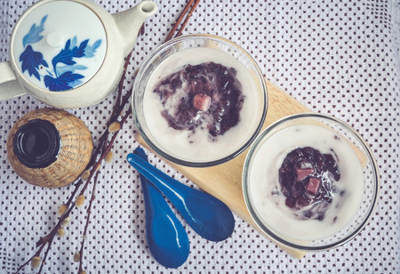 Black sticky rice with taro and coconut milk, Thai traditional dessertの写真素材