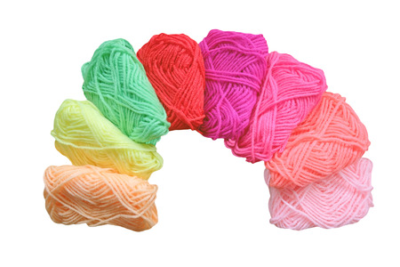 Set of rainbow color wool yarns for knitting on white backgroundの写真素材
