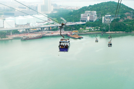 View of Hong kong Island from cable car across to Tian Tan Buddha in Nongping village in Hong Kong Islandのeditorial素材