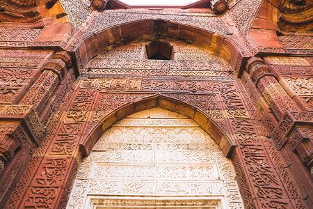 Beautiful Old Calligraphy on the wall in Qutab Minar, Delhi India.の写真素材