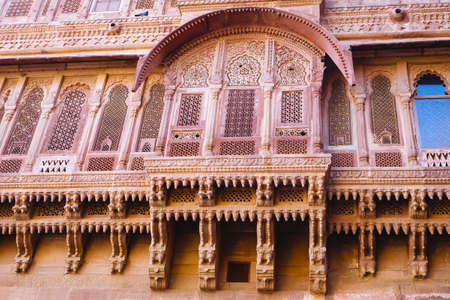 Beautiful details carved facade wall and windows exterior architecture in Mehrangarh fort at Jodhpur Rajasthan, India. Mehrangarh Fort is a world Heritage site.のeditorial素材