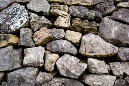 Pattern of decorative nature stone wall background in the parkの写真素材